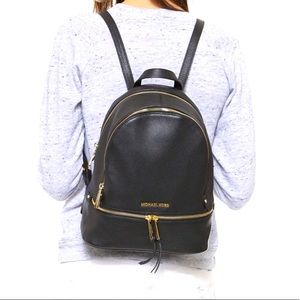 Michael Kors Black Backpack with Gold Accents